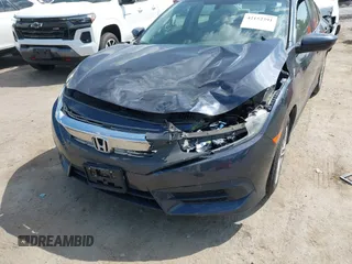 2018 Honda Civic LX with VIN 2HGFC2F53JH560402, listed as a IAAI auction lot 42152391 with 75,384 mi miles and . Bid and sale history available at DreamBid. Image 6.