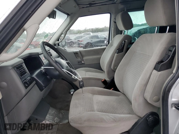 2003 Volkswagen EuroVan с VIN WV2KB47093H041606, выставлен на аукционе Copart как лот 73808224 с пробегом 228 496 миль миль и Чистый • Clean title. История ставок и продаж доступна на DreamBid. Изображение 7.