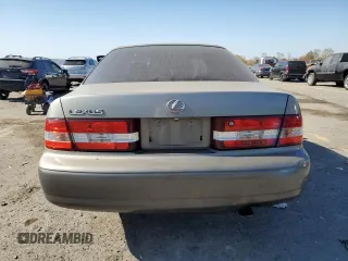 2000 Lexus ES 300 with VIN JT8BF28GXY5091263, listed as a Copart auction lot 61767595 with 250,041 mi miles and Salvage title. Bid and sale history available at DreamBid. Image 6.