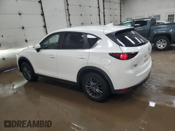 2019 Mazda CX-5 Touring with VIN JM3KFBCM1K0697500, listed as a Copart auction lot 46460735 with 69,412 mi miles and Salvage Title. Bid and sale history available at carsss.com. Image 2.