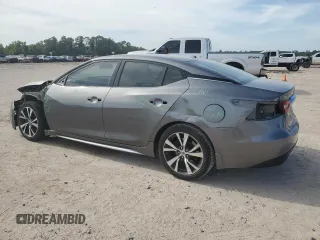 2017 Nissan Maxima SV with VIN 1N4AA6AP8HC433310, listed as a Copart auction lot 56983965 with 101,273 mi miles and Salvage title. Bid and sale history available at DreamBid. Image 2.