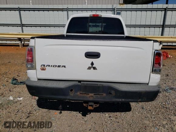 2007 Mitsubishi Raider LS z VIN 1Z7HT28K57S234309, wystawiony jako Copart lot #75505104 z przebiegiem 210 964 mil mil oraz Szkoda całkowita • Salvage title. Historia ofert i sprzedaży dostępna na DreamBid. Obrazek 6.
