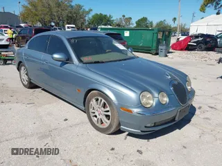 2004 Jaguar S-Type with VIN SAJEA01U94HM97854, listed as a IAAI auction lot 41756674 with 173,753 mi miles and . Bid and sale history available at DreamBid. Image 1.