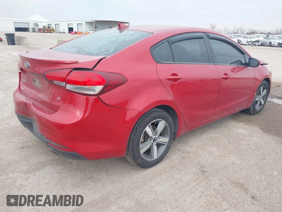 2018 Kia Forte LX with VIN 3KPFL4A7XJE187602, listed as a IAAI auction lot 41432177 with 90,573 mi miles and . Bid and sale history available at DreamBid. Image 4.