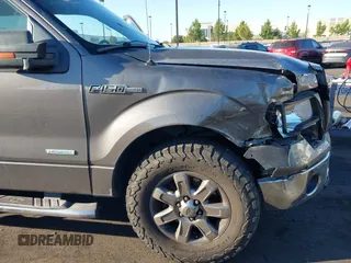 2014 Ford F-150 XL z VIN 1FTFW1CT0EFB69945, wystawiony jako IAAI lot #42507421 z przebiegiem 141 167 mil mil oraz . Historia ofert i sprzedaży dostępna na DreamBid. Obrazek 12.