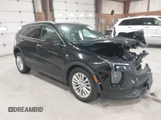 2024 Cadillac XT4 AWD Luxury with VIN 1GYFZBR4XRF108969, listed as a IAAI auction lot 42400466 with 14,258 mi miles and . Bid and sale history available at DreamBid. Image 1.