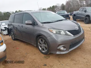 2011 Toyota Sienna SE with VIN 5TDXK3DC3BS143331, listed as a IAAI auction lot 41758043 with 215,490 mi miles. Bid and sale history available at carsss.com. Image 1.