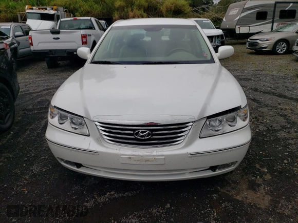 2010 Hyundai Azera GLS z VIN KMHFC4DD4AA513796, wystawiony jako Copart lot #59782965 z przebiegiem 56 958 mil mil oraz Szkoda całkowita • Salvage title. Historia ofert i sprzedaży dostępna na DreamBid. Obrazek 5.