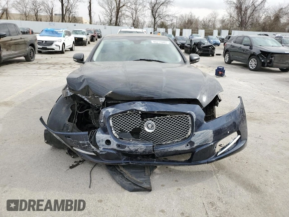 2013 Jaguar XJ z VIN SAJWJ1CD5D8V53294, wystawiony jako Copart lot #49711445 z przebiegiem 100 675 mil mil oraz Szkoda całkowita • Salvage title. Historia ofert i sprzedaży dostępna na DreamBid. Obrazek 5.