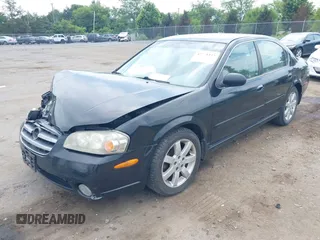 2002 Nissan Maxima GXE with VIN JN1DA31D52T429057, listed as a IAAI auction lot 42771435 with 122,398 mi miles and . Bid and sale history available at DreamBid. Image 2.