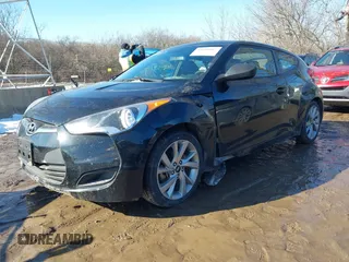 2016 Hyundai Veloster z VIN KMHTC6AD1GU262391, wystawiony jako IAAI lot #41649087 z przebiegiem 96 104 mil mil oraz . Historia ofert i sprzedaży dostępna na DreamBid. Obrazek 17.