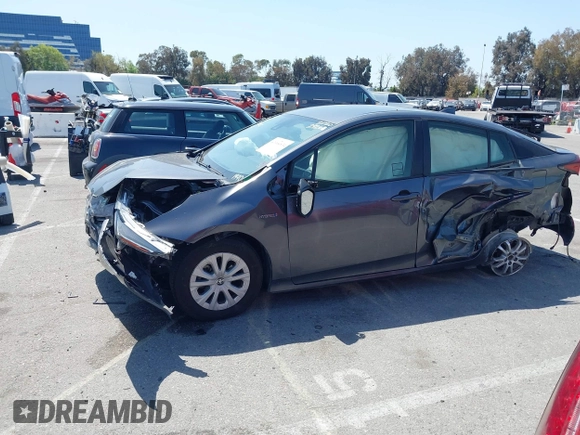 2020 Toyota Prius L Eco z VIN JTDKARFU3L3111990, wystawiony jako IAAI lot #41964834 z przebiegiem 67 873 mil mil oraz . Historia ofert i sprzedaży dostępna na DreamBid. Obrazek 14.