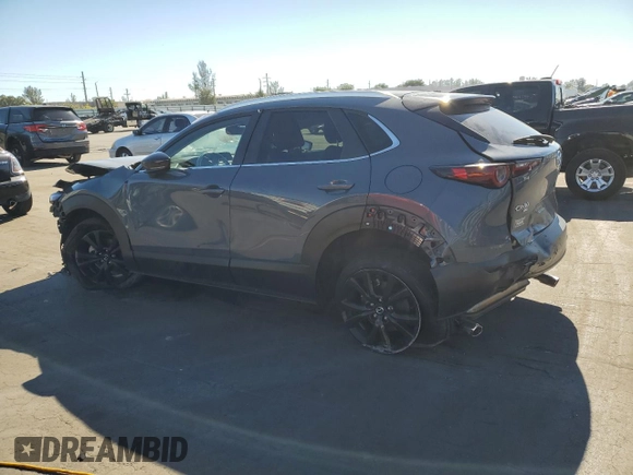 2023 Mazda CX-30 2.5 S Carbon Edition with VIN 3MVDMBCM5PM508471, listed as a Copart auction lot 87279944 with 29,756 mi miles and Non Repairable. Bid and sale history available at carsss.com. Image 2.