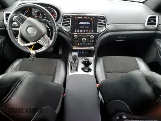 2021 Jeep Grand Cherokee Laredo X with VIN 1C4RJFAG5MC855915, listed as a Copart auction lot 52577035 with 37,253 mi miles and Salvage Title. Bid and sale history available at carsss.com. Image 8.