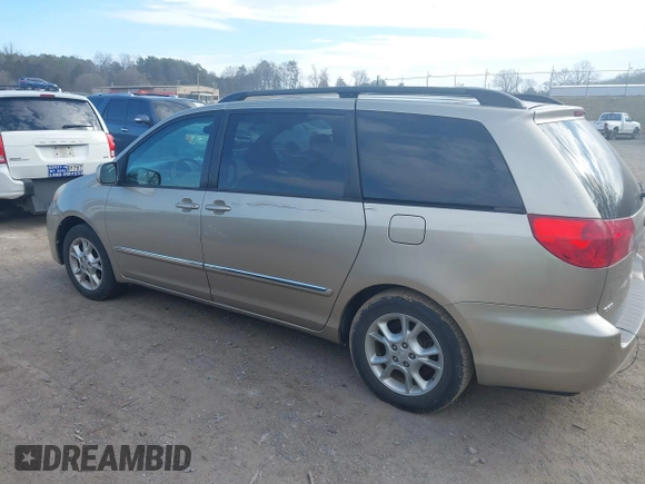 2006 Toyota Sienna XLE with VIN 5TDZA22C16S571350, listed as a IAAI auction lot 41725551 with 233,487 mi miles. Bid and sale history available at carsss.com. Image 6.
