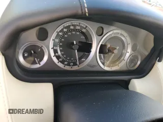 2015 Aston Martin DB9 z VIN SCFFDAFM3FGB16585, wystawiony jako Copart lot #76159354 z przebiegiem Nie podano mil oraz Szkody całkowita. Historia ofert i sprzedaży dostępna na DreamBid. Obrazek 9.