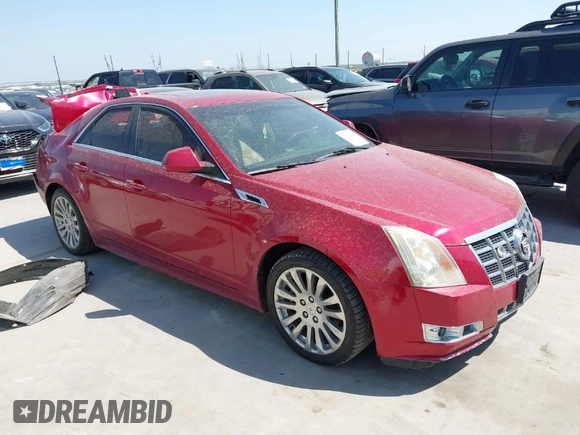 2012 Cadillac CTS Premium z VIN 1G6DP5E3XC0116312, wystawiony jako IAAI lot #41804403 z przebiegiem 148 570 mil mil oraz . Historia ofert i sprzedaży dostępna na DreamBid. Obrazek 1.