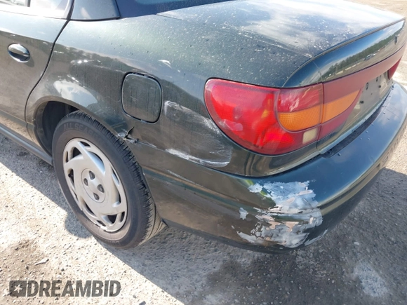 2000 Saturn SL z VIN 1G8ZK5271YZ165467, wystawiony jako IAAI lot #42367156 z przebiegiem 185 962 mil mil oraz . Historia ofert i sprzedaży dostępna na DreamBid. Obrazek 14.