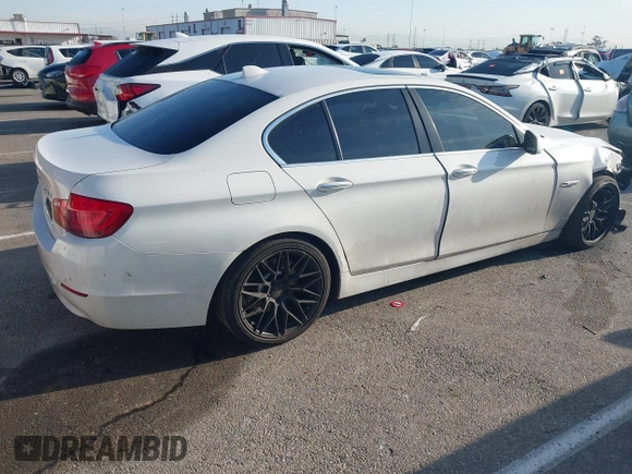 2013 BMW 5 Series 528i with VIN WBAXG5C55DD233592, listed as a IAAI auction lot 41827491 with 113,342 mi miles and . Bid and sale history available at carsss.com. Image 4.