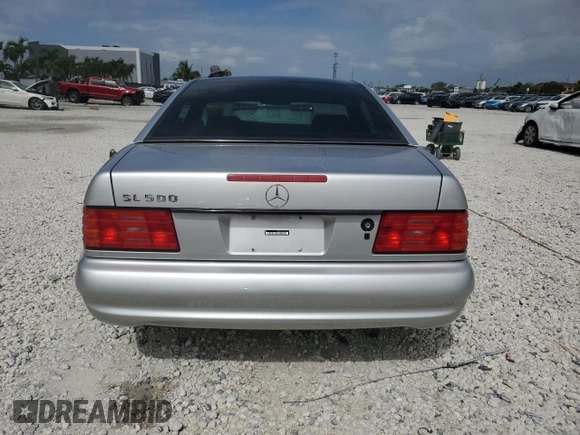 1997 Mercedes-Benz SL-Class with VIN WDBFA67F2VF151123, listed as a Copart auction lot 52703395 with 76,649 mi miles and Non Repairable. Bid and sale history available at carsss.com. Image 6.