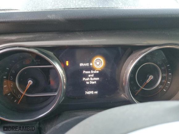 2019 Jeep Wrangler Unlimited Sahara with VIN 1C4HJXEN4KW567051, listed as a Copart auction lot 43479935 with 74,095 mi miles and Salvage Title. Bid and sale history available at carsss.com. Image 9.