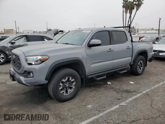 2021 Toyota Tacoma SR with VIN 3TMCZ5AN4MM402889, listed as a Copart auction lot 59942695 with 61,504 mi miles and Salvage title. Bid and sale history available at DreamBid. Image 1.