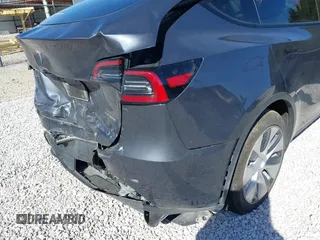 2023 Tesla Model Y Long Range with VIN 7SAYGAEE7PF971620, listed as a IAAI auction lot 41654688 with Not Provided miles and . Bid and sale history available at DreamBid. Image 23.