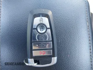 2019 Ford Fusion Titanium with VIN 3FA6P0RUXKR141565, listed as a IAAI auction lot 42323999 with 206,397 mi miles and . Bid and sale history available at DreamBid. Image 11.