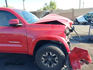 2020 Toyota Tacoma SR5 with VIN 3TMAZ5CN5LM139511, listed as a IAAI auction lot 42379892 with 114,204 mi miles and . Bid and sale history available at DreamBid. Image 18.
