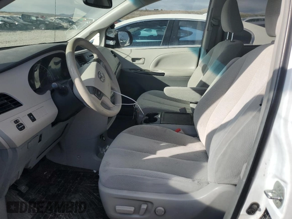 2014 Toyota Sienna LE with VIN 5TDJK3DC3ES085263, listed as a Copart auction lot 46719465 with Not Provided miles and Clean Title. Bid and sale history available at DreamBid. Image 7.