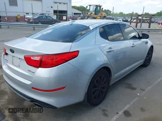 2015 Kia Optima EX with VIN 5XXGN4A70FG360623, listed as a IAAI auction lot 42112315 with 262,058 mi miles and . Bid and sale history available at carsss.com. Image 4.