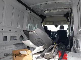2024 Ford Transit Cargo z VIN 1FTBR1C84RKA32473, wystawiony jako IAAI lot #42438142 z przebiegiem 40 817 mil mil oraz . Historia ofert i sprzedaży dostępna na DreamBid. Obrazek 22.
