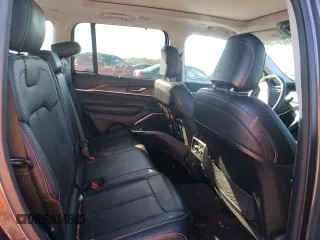 2023 Jeep Grand Cherokee 30th Anniversary z VIN 1C4RJYB64P8769262, wystawiony jako Copart lot #84694194 z przebiegiem 25 239 mil mil oraz Szkoda całkowita • Salvage title. Historia ofert i sprzedaży dostępna na DreamBid. Obrazek 11.