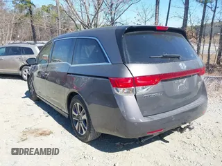 2014 Honda Odyssey Touring with VIN 5FNRL5H92EB016546, listed as a IAAI auction lot 41689148 with 143,601 mi miles and . Bid and sale history available at DreamBid. Image 14.
