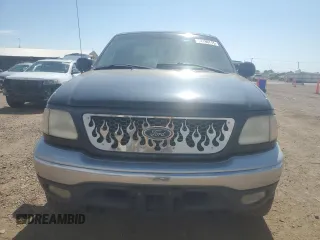 2001 Ford F-150 XL with VIN 1FTRX18L71NA27627, listed as a Copart auction lot 64190715 with 105,503 mi miles and Salvage title. Bid and sale history available at DreamBid. Image 5.
