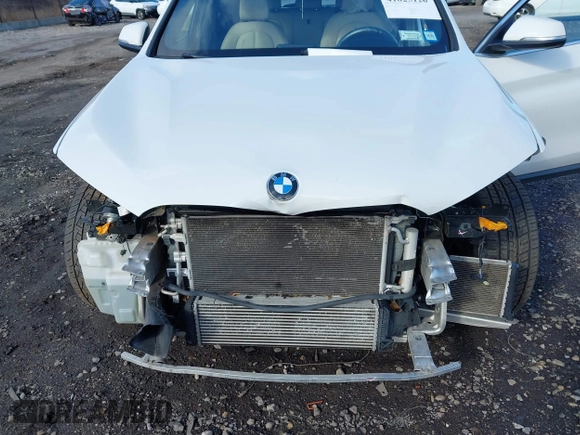2018 BMW X1 xDrive28i with VIN WBXHT3C34J5L29714, listed as a IAAI auction lot 41825126 with 89,970 mi miles. Bid and sale history available at carsss.com. Image 6.