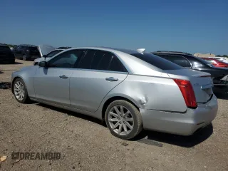 2016 Cadillac CTS RWD with VIN 1G6AP5SX4G0132098, listed as a Copart auction lot 52594175 with 104,683 mi miles and Salvage Title. Bid and sale history available at DreamBid. Image 2.