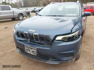 2020 Jeep Cherokee Latitude with VIN 1C4PJLCB3LD528042, listed as a IAAI auction lot 41301453 with 129,188 mi miles. Bid and sale history available at carsss.com. Image 6.