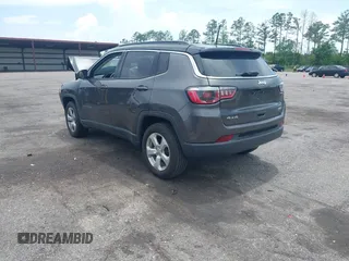 2018 Jeep Compass Latitude with VIN 3C4NJDBB6JT342520, listed as a IAAI auction lot 42464673 with 66,680 mi miles and . Bid and sale history available at DreamBid. Image 3.