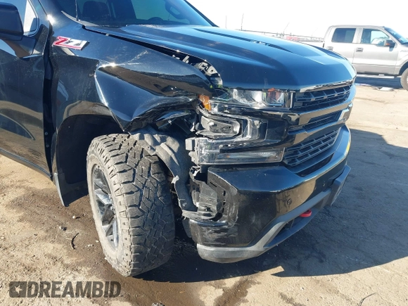 2021 Chevrolet Silverado 1500 LT Trail Boss with VIN 1GCPYFEL8MZ254411, listed as a IAAI auction lot 41313530 with 32,409 mi miles and . Bid and sale history available at DreamBid. Image 6.