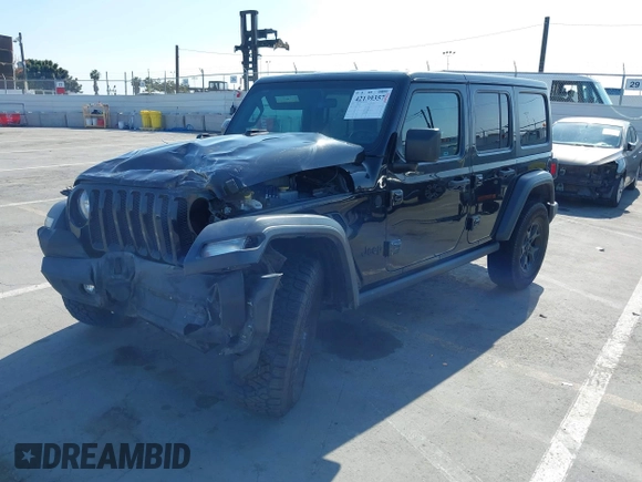 2020 Jeep Wrangler Unlimited Freedom with VIN 1C4HJXDG0LW238819, listed as a IAAI auction lot 42139357 with 67,619 mi miles and . Bid and sale history available at DreamBid. Image 2.