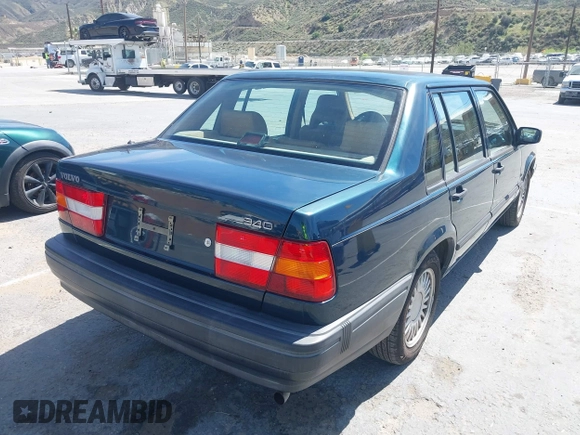1995 Volvo 900 with VIN YV1JS8313S1197383, listed as a IAAI auction lot 41877807 with 140,298 mi miles and . Bid and sale history available at DreamBid. Image 4.
