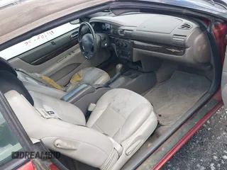2004 Chrysler Sebring Limited with VIN 1C3EL65R54N412483, listed as a IAAI auction lot 41980106 with 125,819 mi miles and . Bid and sale history available at DreamBid. Image 5.
