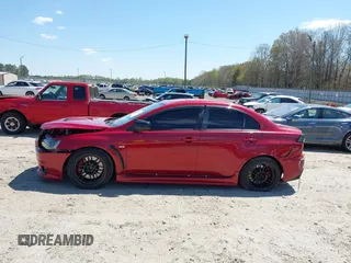 2008 Mitsubishi Lancer Evolution GSR with VIN JA3AW86V38U050561, listed as a IAAI auction lot 41879629 with 104,905 mi miles. Bid and sale history available at carsss.com. Image 14.