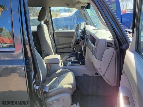 2010 Jeep Commander Sport with VIN 1J4RH4GK9AC147040, listed as a IAAI auction lot 41975670 with 89,213 mi miles. Bid and sale history available at carsss.com. Image 5.