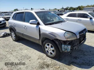 2005 Hyundai Tucson GLS with VIN KM8JN12D45U042095, listed as a Copart auction lot 69722604 with 182,394 mi miles and Salvage Title. Bid and sale history available at carsss.com. Image 4.