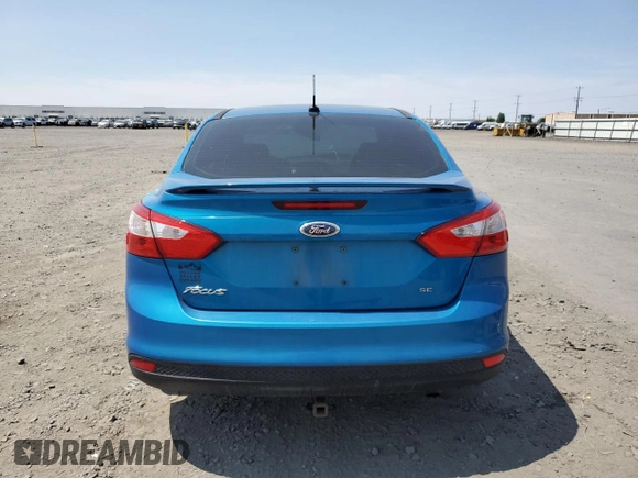 2012 Ford Focus SE with VIN 1FAHP3F22CL468085, listed as a Copart auction lot 61263665 with Not provided miles and Salvage title. Bid and sale history available at DreamBid. Image 6.