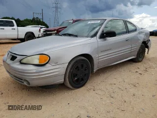 1999 Pontiac Grand Am z VIN 1G2NE12E3XM901263, wystawiony jako Copart lot #55723445 z przebiegiem 163 946 mil mil oraz Szkoda całkowita • Salvage title. Historia ofert i sprzedaży dostępna na DreamBid. Obrazek 1.