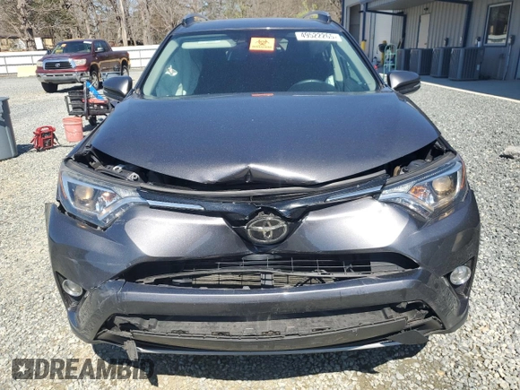 2018 Toyota RAV4 XLE with VIN 2T3WFREV7JW470850, listed as a Copart auction lot 49522265 with 102,029 mi miles and Salvage Title. Bid and sale history available at carsss.com. Image 5.