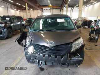 2015 Toyota Sienna L with VIN 5TDZK3DCXFS567507, listed as a IAAI auction lot 41205670 with 104,443 mi miles and . Bid and sale history available at DreamBid. Image 13.